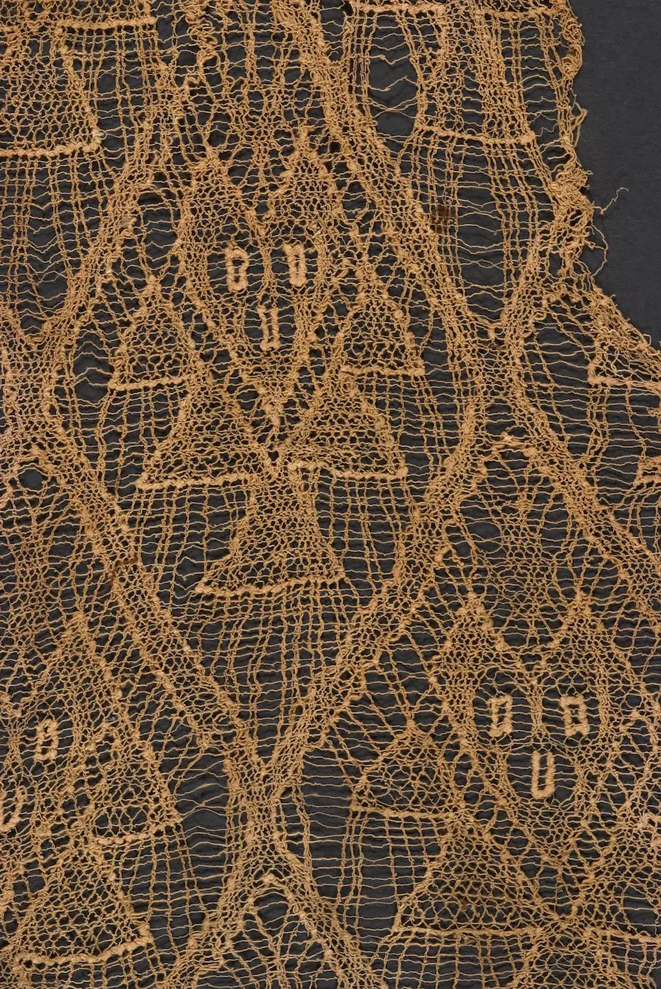 The lifetime of a particle is suggested by this ancient network of threads and spectral figures.